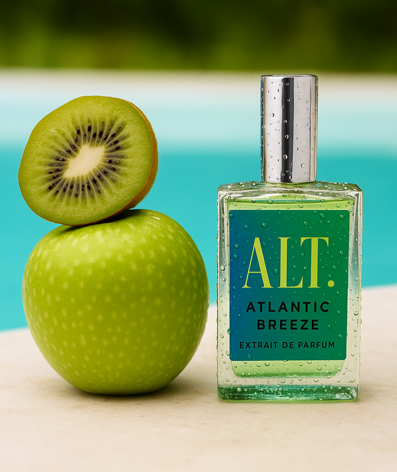 Louis Vuitton Pacific Chill Dupe next to an apple and kiwi beside a pool. 