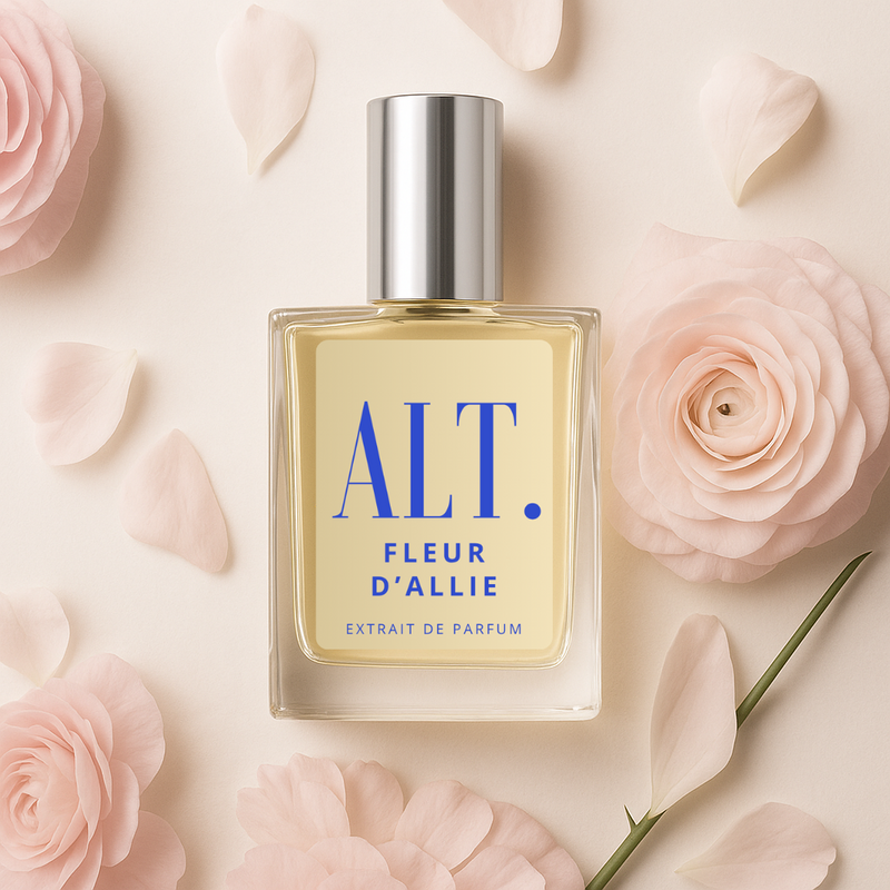 Ex Nihilo Fleur Narcotique Dupe surrounded by light pink roses and stems