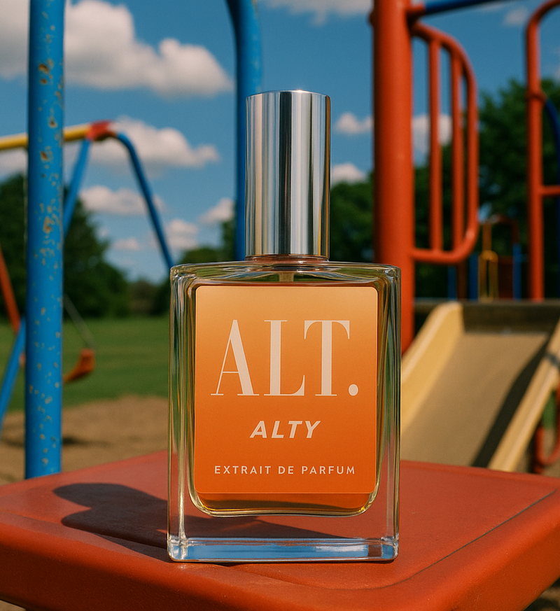 MFK Kurky Dupe. ALT. Fragrances Alty fragrance bottle on a playground.